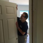 Vince LaLima works on the door hanging team at a habitat for humanity home